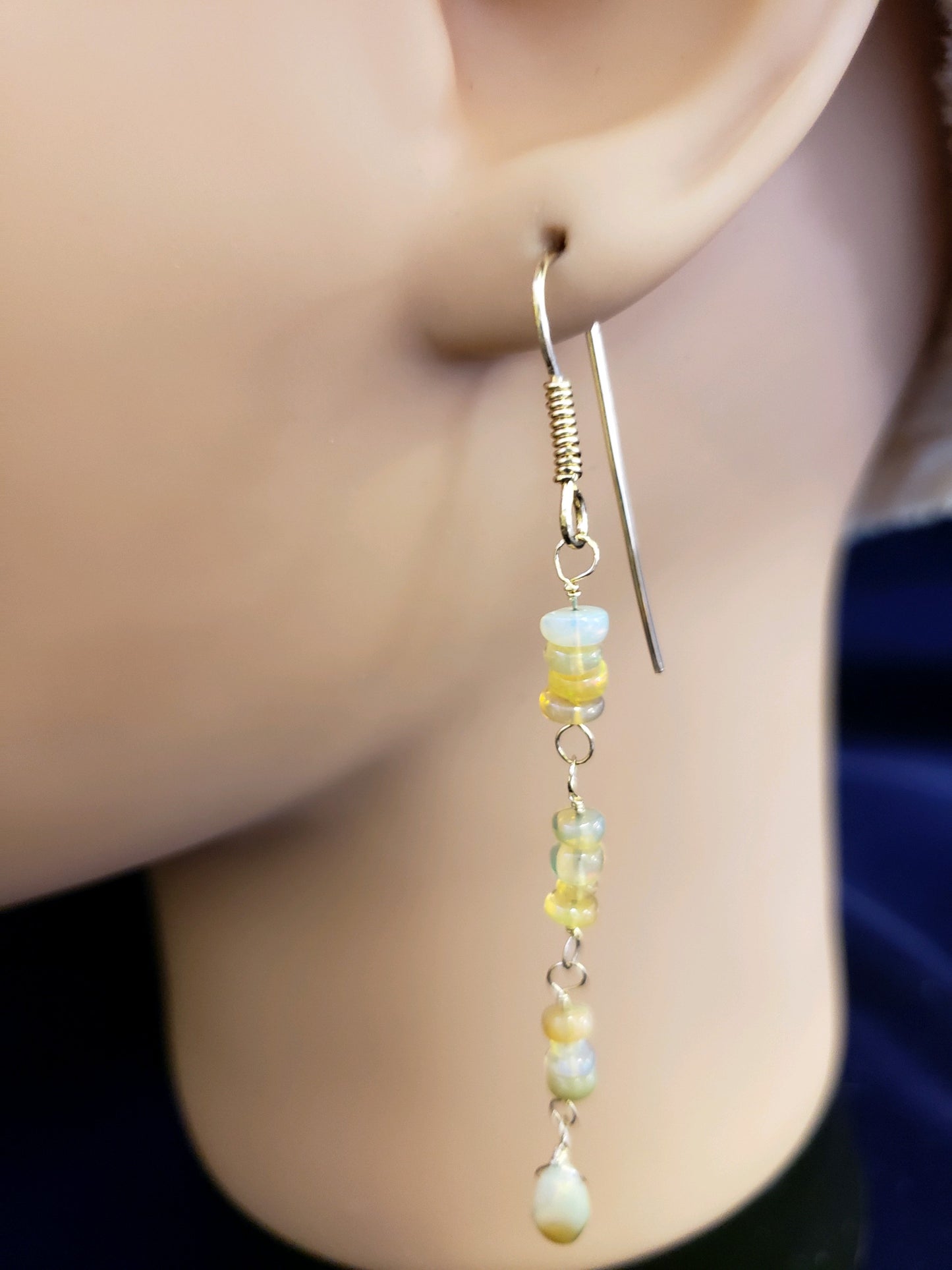 Earrings with colorful beads and a opal