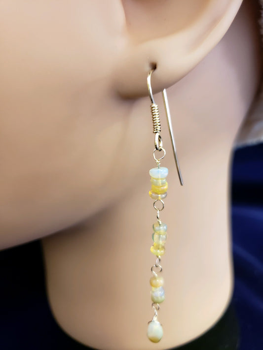 Earrings with colorful beads and a opal