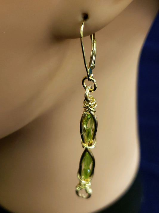 Peridot gemstone earring on a mannequin 